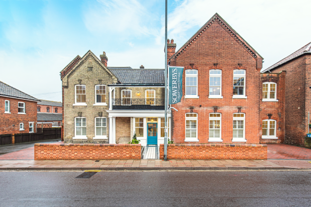 Outside of Collison Place with Sowerbys sign
